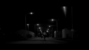 a_girl_walks_home_alone_at_night